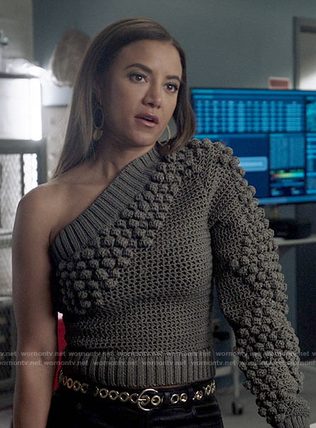 Maria’s one-shoulder pom pom sweater on Roswell New Mexico