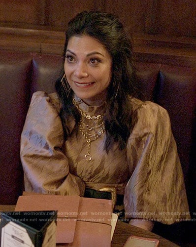 Nikki’s gold puff sleeve top on She-Hulk Attorney at Law