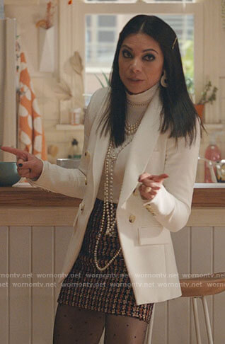 Nikki’s white blazer and tweed houndstooth mini skirt on She-Hulk Attorney at Law