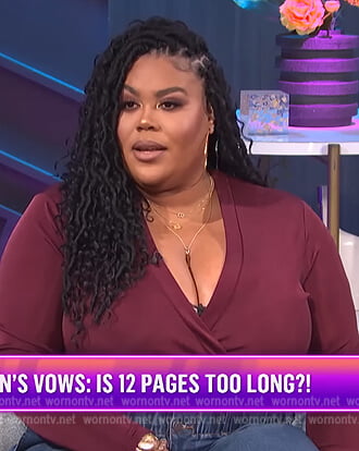 Nina’s burgundy wrap bodysuit on E! News Nightly Pop