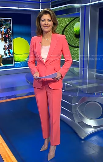 Norah’s pink blazer and trousers on CBS Evening News
