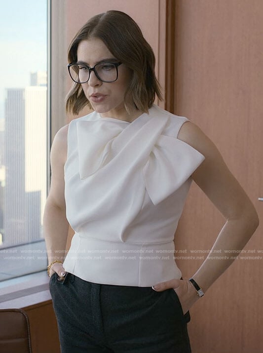 Rachel’s white bow top on Partner Track