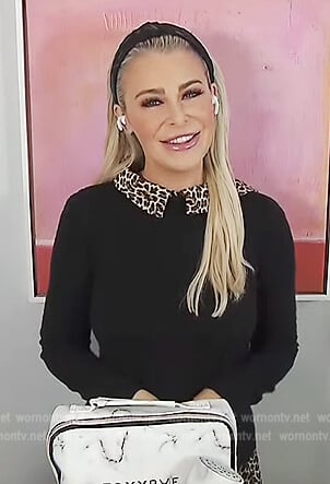 Saddie Murray’s leopard collared layered sweater on Extra