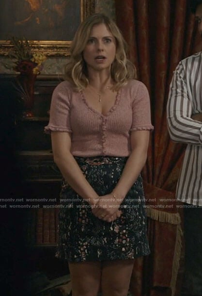 Sam’s blush pink ruffle-trim cardigan and floral skirt on Ghosts