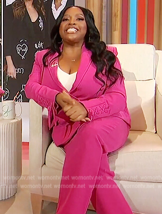 Sherri’s fuchsia lace-up blazer on Sherri