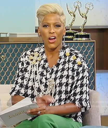 Tamron’s houndstooth brooch embellished top on Tamron Hall Show