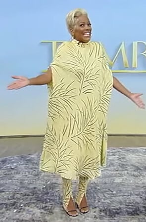 Tamron’s yellow leaf print dress and leggings on Tamron Hall Show