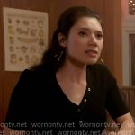 Violet’s black short sleeve cardigan on Chicago Fire