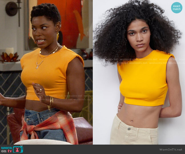 Zara Shoulder Pad Top in Orange worn by Necie (Chelsea Harris) on The Neighborhood