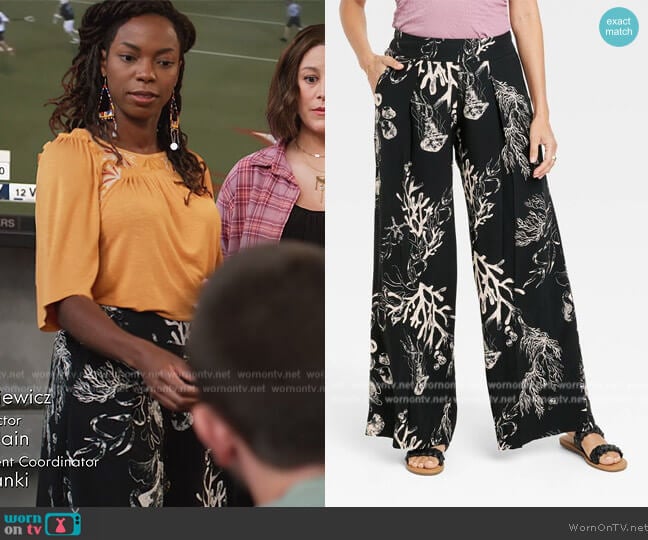 A New Day High-Rise Wide Leg Pants worn by Denise (Sasheer Zamata) on Home Economics