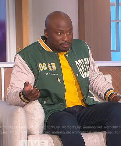 Akbar’s green bomber jacket on The Talk