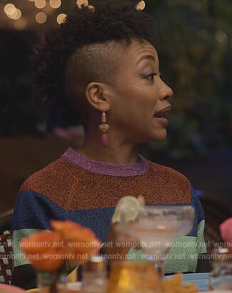 Autum’s metallic stripe sweater on Reasonable Doubt