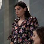 Brook Lynn’s black floral v-neck blouse on General Hospital