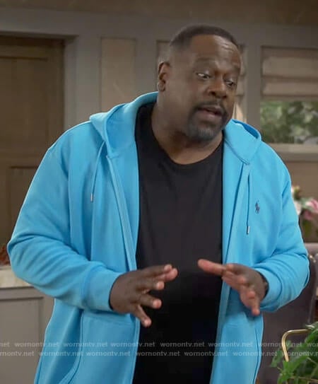 Calvin’s turquoise blue hoodie on The Neighborhood
