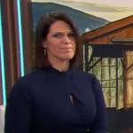 Dana Jacobson’s navy keyhole dress on CBS Saturday Morning