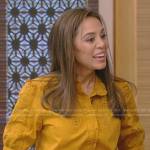 Dr. Holly Phillips’s orange embroidered top on Live with Kelly and Ryan