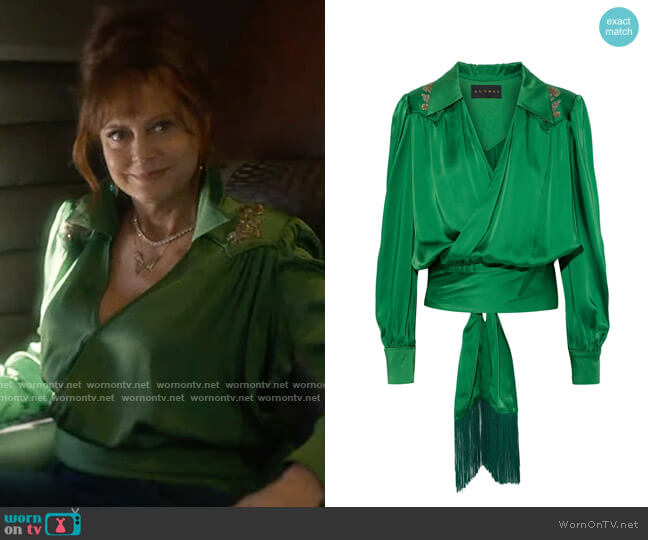 Dundas Fringe-trimmed appliquéd satin wrap blouse worn by Dottie Cantrell Roman (Susan Sarandon) on Monarch