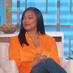 Garcelle Beauvais’s orange feather cuff blazer on The Talk