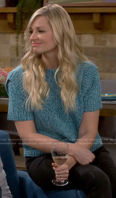 Gemma’s teal short sleeve sweater on The Neighborhood