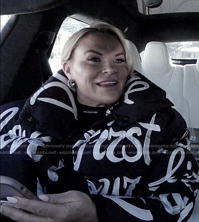 Heather’s black graphic print puffer jacket on The Real Housewives of Salt Lake City