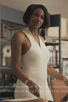 Jax’s white zip front dress on Reasonable Doubt