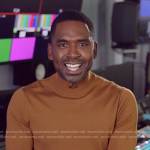 Justin’s beige turtleneck sweater on E! News Nightly Pop