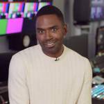 Justin’s white textured sweater on E! News Nightly Pop