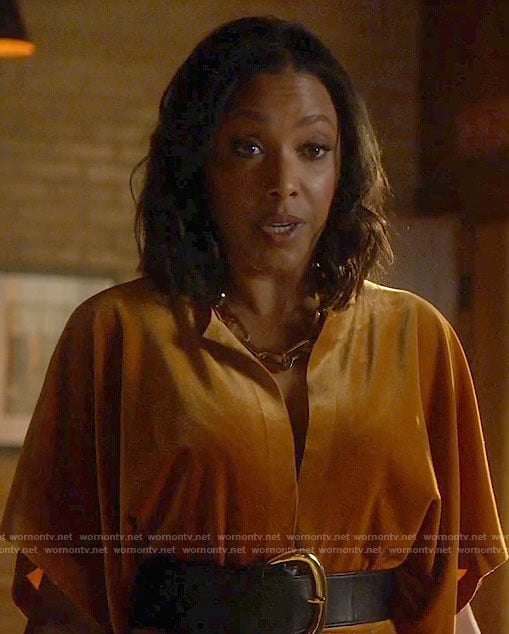 Kayla’s orange velvet jumpsuit on Monarch