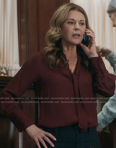 Kit’s burgundy tie neck blouse on The Resident