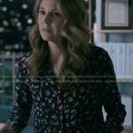 Kit’s black floral button down blouse on The Resident
