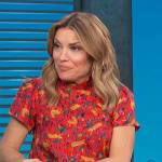 Kit’s red animal print short sleeve top on Access Hollywood