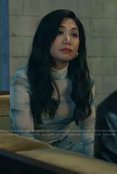 Mel’s landscape print mock-neck top on The Equalizer