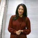 Nancy Chen’s red tie neck blouse on CBS Mornings
