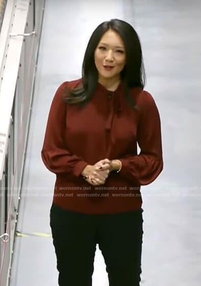 Nancy Chen’s red tie neck blouse on CBS Mornings