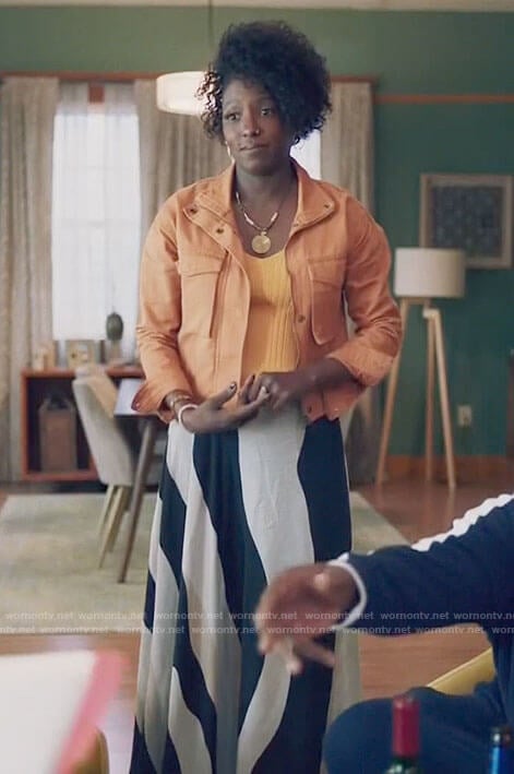 Nova’s orange jacket and wavy stripe skirt on Queen Sugar
