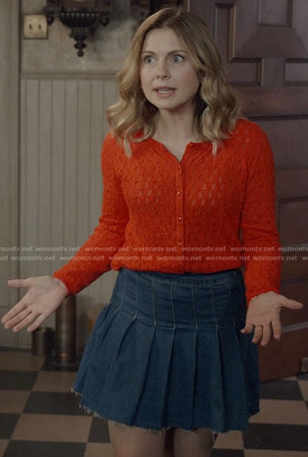 Sam’s red pointelle cardigan and pleated denim skirt on Ghosts
