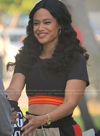 Shanelle’s black cropped striped trim tee on Reasonable Doubt