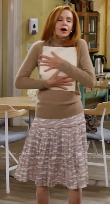 Sheila’s beige zebra stripe skirt on Call Me Kat