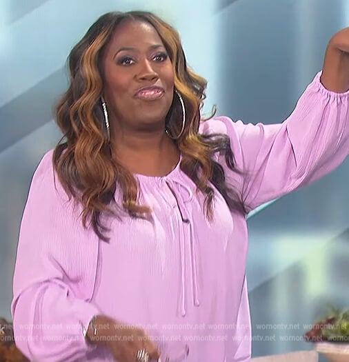 Sheryl’s lavender tie neck blouse on The Talk