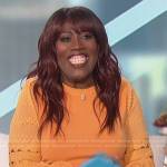 Sheryl’s orange embroidered top on The Talk