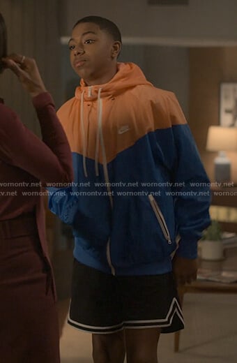 Spenser’s orange and blue colorblock jacket on Reasonable Doubt