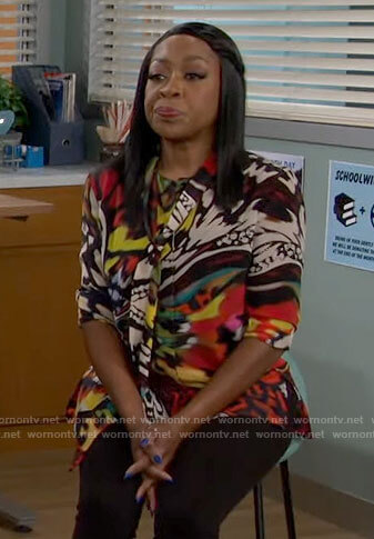 Tina’s butterfly wing print blouse on The Neighborhood