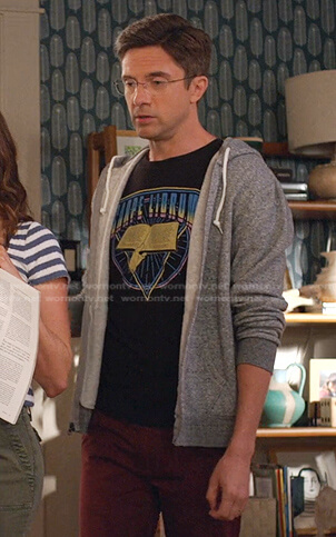Tom’s black Carpe Librum print tee on Home Economics