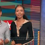 Zuri’s black contrast trim polo dress on Access Hollywood