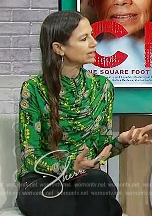 Justine Bateman’s green floral top on Sherri