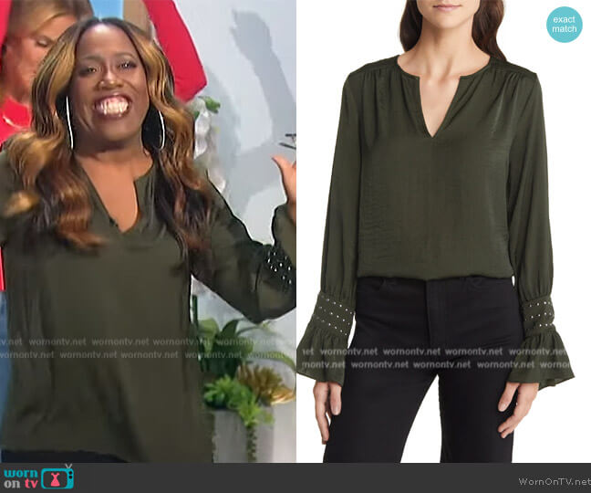 Vince Camuto Studded Cuff Split Neck Blouse worn by Sheryl Underwood on The Talk