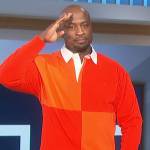 Akbar’s orange two-tone rugby shirt on The Talk