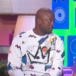 Akbar’s white printed sweatshirt on The Talk