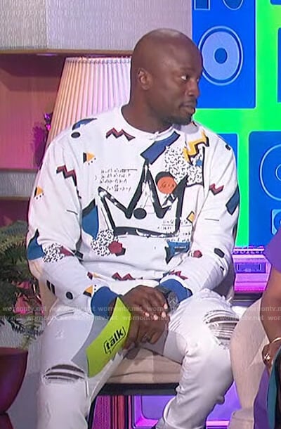 Akbar’s white printed sweatshirt on The Talk