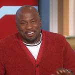 Akbar’s red teddy cardigan on The Talk